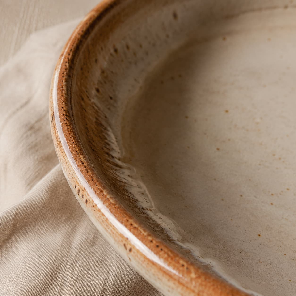 Close-up of a glazed stoneware rim